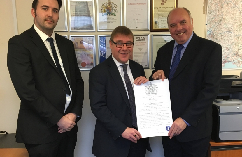 Mark Francois MP with Derek Murton and son David Murton the Directors of European Refrigeration Ltd, showing the Royal Warrant which they were recently awarded for work at Buckingham Palace.