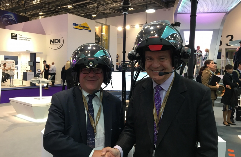 Rayleigh and Wickford MP Mark Francois pictured trying out the new Striker II pilot’s helmet alongside HCDC Chairman Dr Julian Lewis MP.