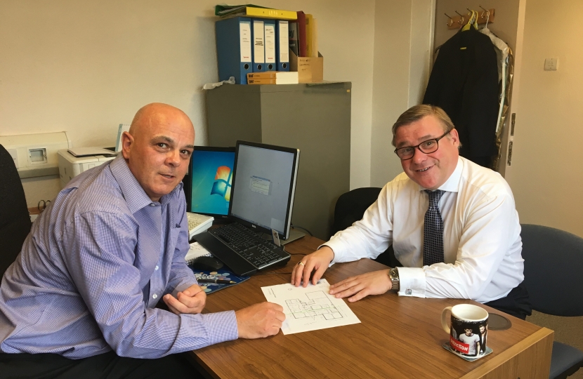 Rayleigh and Wickford MP Mark Francois being shown the plans for the new expanded Riverside Medical Centre in Hullbridge by the Practice Manager Mr Martyn Smith