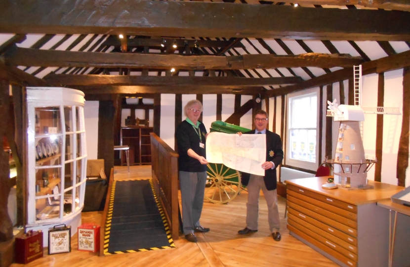 Mark Francois presenting a copy of a WWI era OS Map of Essex to Mike Davies