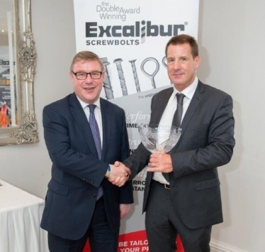 Mark Francois pictured with Director of Excalibur Screwbolts John Stevens and their recent Queen’s Award for Innovation, which was presented to the firm who are based in Hockley.