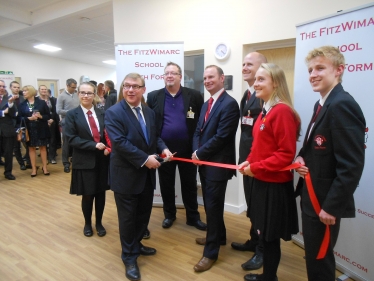 Mark Francois pictured cutting a ribbon at the opening ceremony of the new FitzWimarc School sixth form.