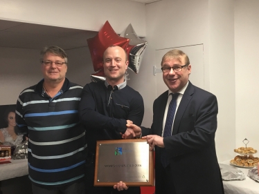 Mark Francois pictured alongside Gary Bacon of the Veolia North Thames Trust and Paul Reynolds, the chairman of the Ultima Trampoline club, handing over a plaque to commemorate the completion of their new club facilities in Wickford 