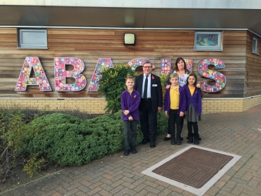 Mark pictured with Headteacher Heidi Blakeley and pupils during a recent visit to Abacus Primary School in Wickford.