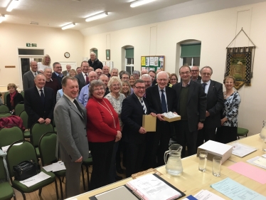 Rayleigh and Wickford MP Mark Francois presenting outgoing Chairman Hilton Brown with a special gift at the recent Rayleigh and Wickford Conservative Association Annual General Meeting.