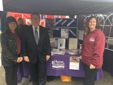 Mark Francois MP pictured with Helen and Jo from local care company Home Instead during his recent visit to the May Fest event in Basildon.