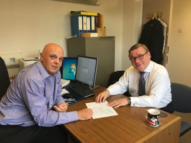 Rayleigh and Wickford MP Mark Francois being shown the plans for the new expanded Riverside Medical Centre in Hullbridge by the Practice Manager Mr Martyn Smith