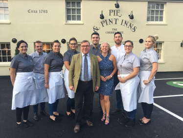 Rayleigh and Wickford MP Mark Francois pictured with co-owner Lisa Honeyman and her staff at the reopening of The Cherry Tree Pub on the Stambridge Road.