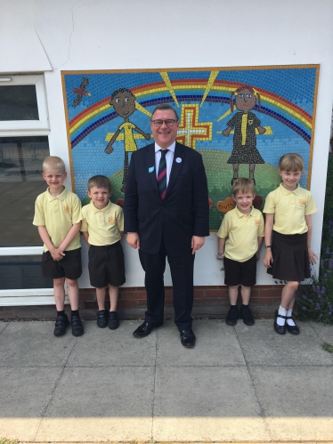 Rayleigh and Wickford MP Mark Francois pictured with pupils who helped to create a new religious mural at Wickford C of E Infant School.