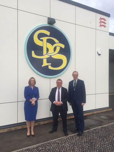 Mark Francois MP outside the new teaching block at Sweyne Park  School with headteacher Katherine Dines and Project Manager Simon Smith