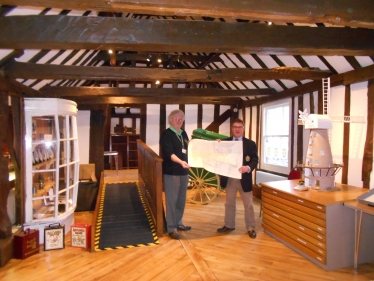 Mark Francois presenting a copy of a WWI era OS Map of Essex to Mike Davies